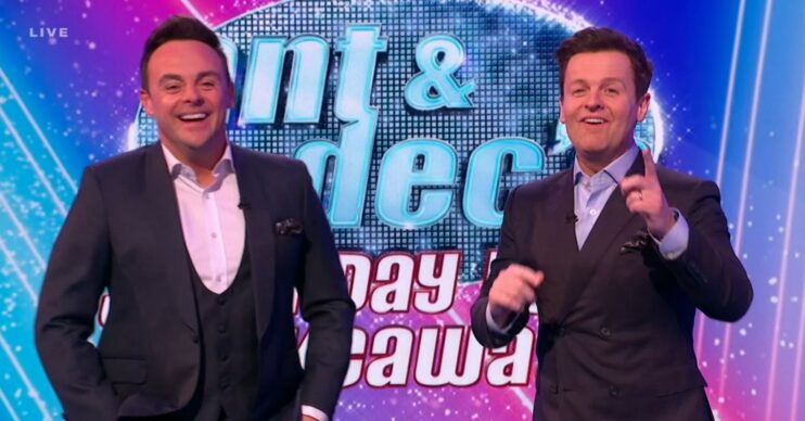 Ant and Dec laugh and point as they host Saturday Night Takeaway