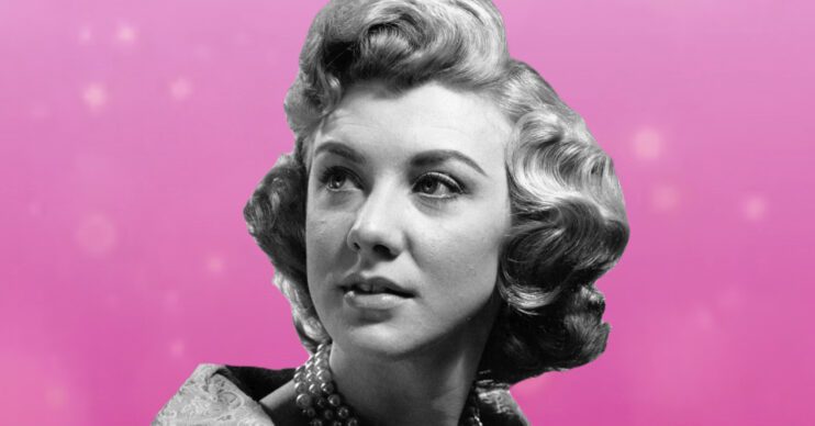 A black and white photo of Joan Savage, a pink background