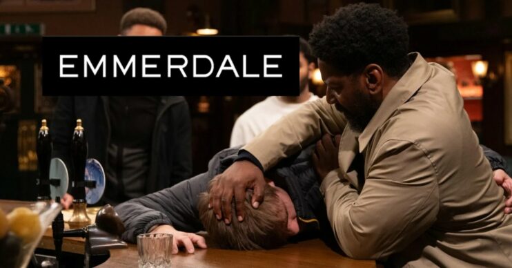Emmerdale tonight image of Charles pinning Tom to the bar by his head with show logo