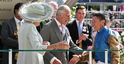 Frankie Dettori  is presented the Gold Cup in June 2023 by King Charles and Queen Camilla