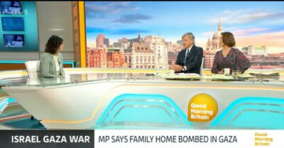Richard Madeley and co-host Susanna Reid interviewing a guest on Good Morning Britain