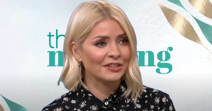 Holly Willoughby in front of This Morning logo