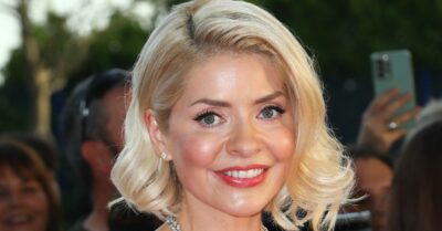 Holly Willoughby smiling on the red carpet
