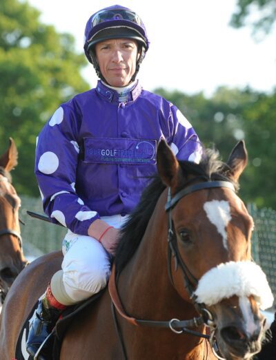 Frankie Dettori rides a horse