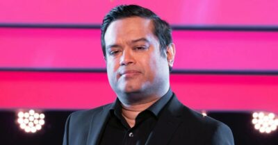 Paul Sinha smiles for the camera