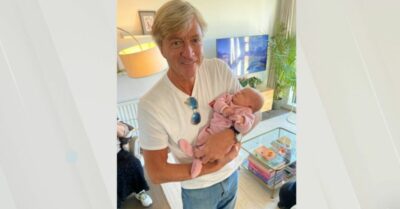 Richard Madeley holding granddaughter Wren
