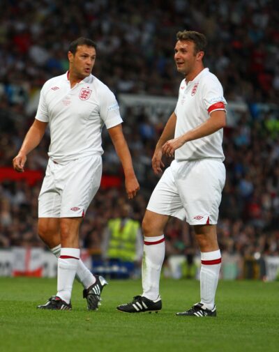 Jonathan Wilkes and Paddy McGuinness playing football for Soccer Aid