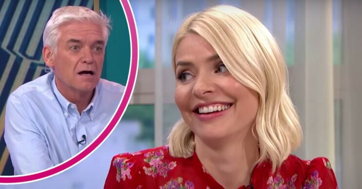 Phillip Schofield looks concered, Holly Willoughby smiles