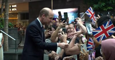 Prince William greeting fans in Singapore