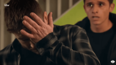 David grabs his face after Jacob punches him