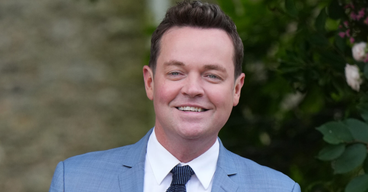 Stephen Mulhern wearing a blue suit smiling